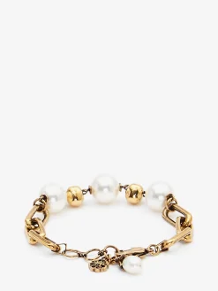 Discount Alexander McQueen Women's Pearl-like Skull Chain Bracelet in Antique Gold